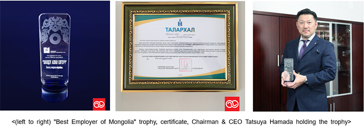 (left to right) "Best Employer of Mongolia" trophy, certificate, Chairman & CEO Tatsuya Hamada holding the trophy